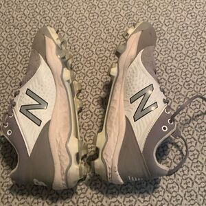 Size 11 NB Baseball Cleats. Great condition